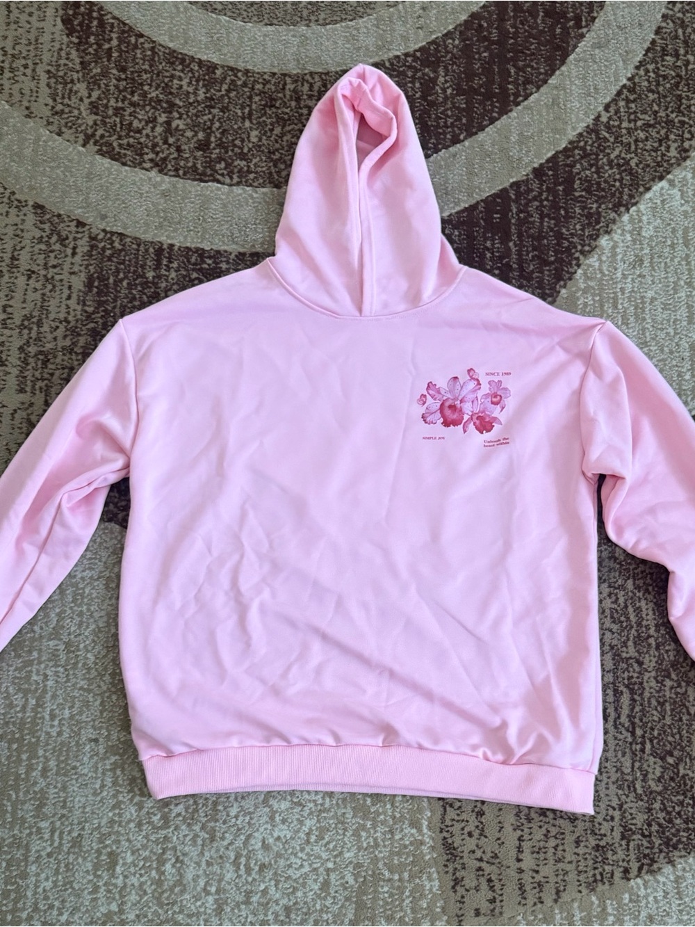 Simple Pink Pullover Hoodie with Floral Graphic